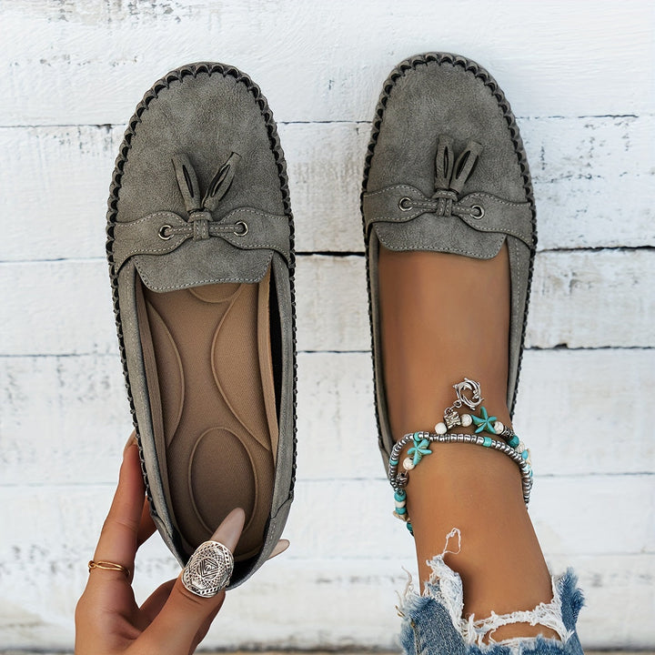 Nadine - klassiska loafers med tofsdetalj