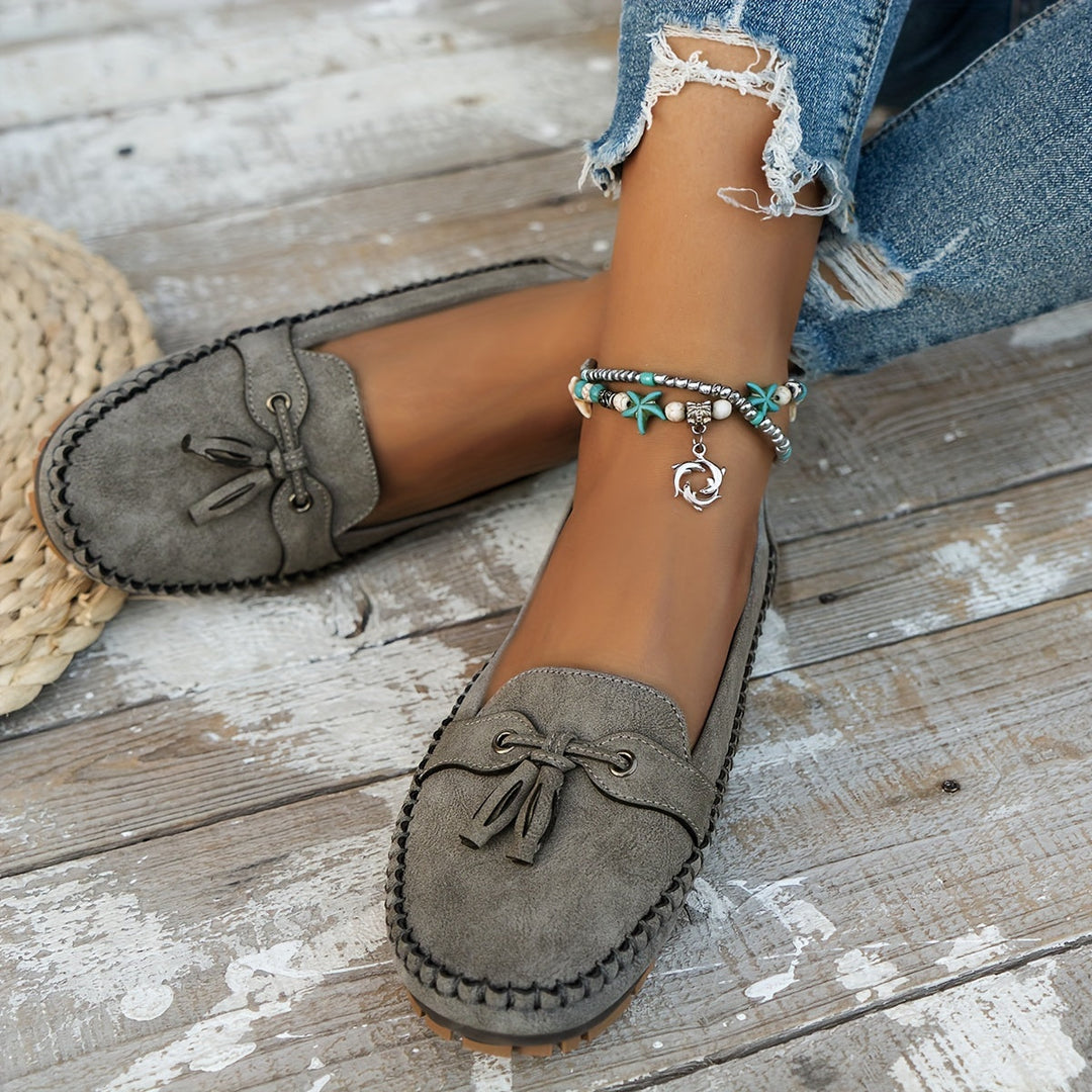 Nadine - klassiska loafers med tofsdetalj